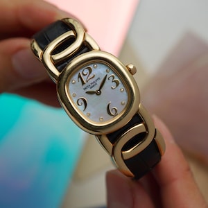 Patek Philippe Ellipse 4830 Mother of Pearl & Diamond 18k Yellow Gold 1990s