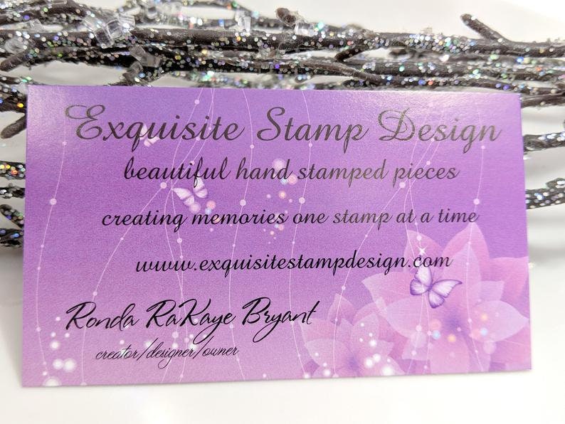 May include: Purple business card with a floral design and butterflies. The text reads "Exquisite Stamp Design", "beautiful hand stamped pieces", "creating memories one stamp at a time", "www.exquisitestampdesign.com", "Ronda RaKaye Bryant", and "creator/designer/owner".