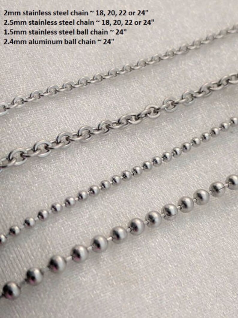May include: Close-up of four different stainless steel and aluminum chains. The chains include a 2mm stainless steel chain, a 2.5mm stainless steel chain, a 1.5mm stainless steel ball chain, and a 2.4mm aluminum ball chain. The chains are available in various lengths, including 18, 20, 22, and 24 inches.
