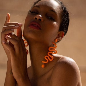 Orange Tube Squiggles dangly statement earrings | fun and funky, unique, light weight, hand made polymer clay jewelry from NYC