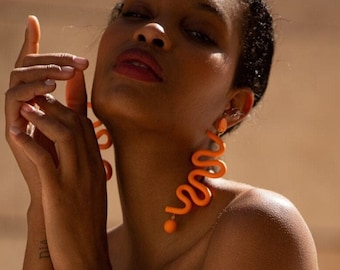 Orange Tube Squiggles dangly statement earrings | fun and funky, unique, light weight, hand made polymer clay jewelry from NYC