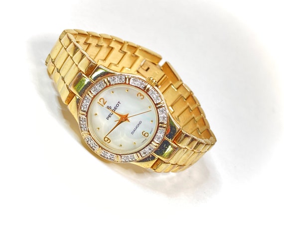 Peugeot gold watch sales