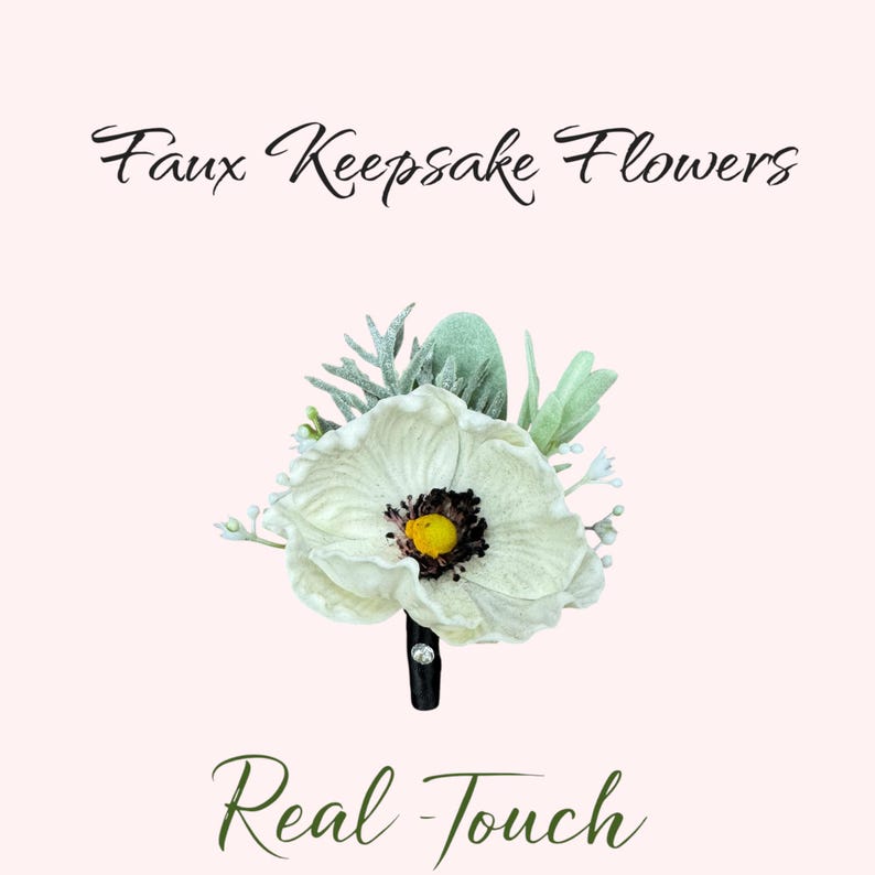 May include: Faux keepsake flowers in a white and green color scheme. The flowers are made to look like real flowers and have a realistic touch. The flowers are arranged in a bouquet and are attached to a black stem.