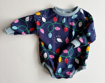 IN STOCK Blue Christmas Lights Long Sleeve Christmas Bubble Romper, Oversize Sweater Romper with Snaps, Baby’s First Christmas