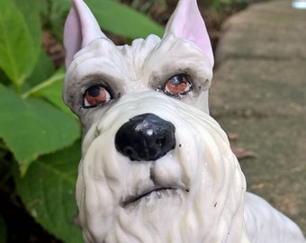Figurina Cane La barchetta di carta