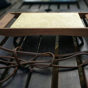 Swinging sixties Hot Plate Features teak handles, gold inlaid triangular decorations, fully functional and totally cool! Heats well fast.