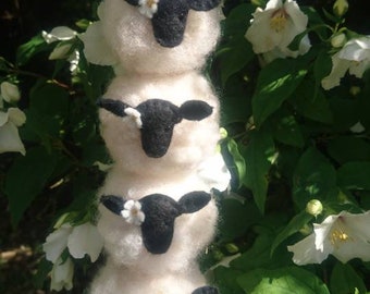 Needle felted sheep and daisy hanging ornament/mobile. Made using wool from my organic flock