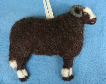 Needle felted Balwen Welsh Mountain sheep hanging ornament with hand embroidered detail. Made with wool from my certified organic flock.