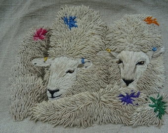 Unique hand embroidered sheep picture.  Unframed on vintage linen fabric