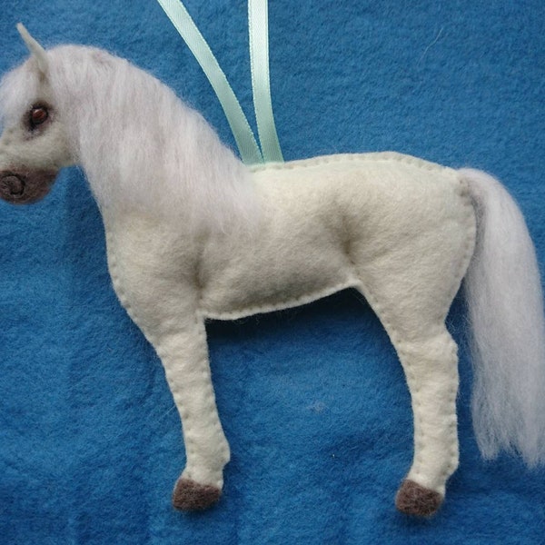 Hand stitched felt horse/pony/unicorn. Hand embroidered detail, needle felted mane & tail. Filled with wool from my organic flock