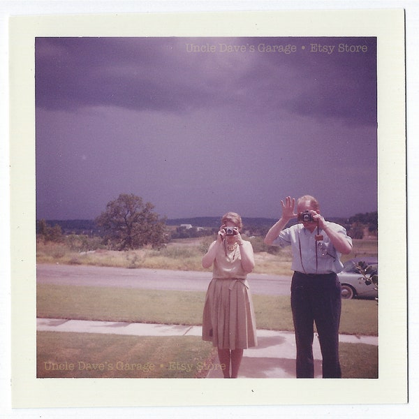 Man & Woman With Cameras With Dark Clouds ~ 1950s-1960s Vintage COLOR Snapshot Photo; Digital Download