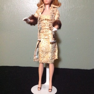 1963 Fashion Queen Barbie wearing 961 Evening Splendor outfit