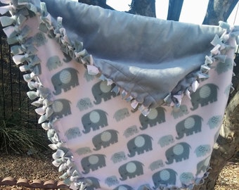 Baby and Mama Elephants Baby Throw in 100% polyester fleece, 20"W x 32"L. Reverse is light grey Minky fleece. Very sweet & oh so soft!