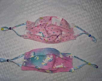 Einhorn Stoffmaske für Kleinkind Mädchen. 2 Masken. 2 Einhorn Drucke. Baumwolle. Waschbar und wiederverwendbar