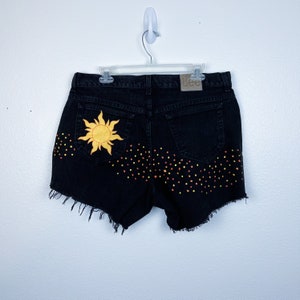Painted Sun Shorts | Waist: 36 | Disney Denim | Disneyland Pants Women | Disney Jeans | Rapunzel Women | Rapunzel Tower | Tangled Sun