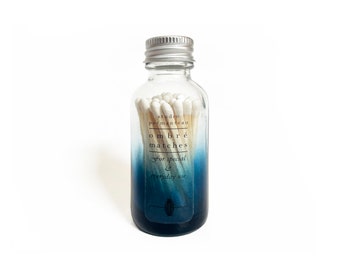 Blue Ombré Bottle Matches. Colorful Glass Match Jar. Pretty Fancy Matches. Strike on Bottle. Pretty Wooden Matchsticks. Light a Spark.