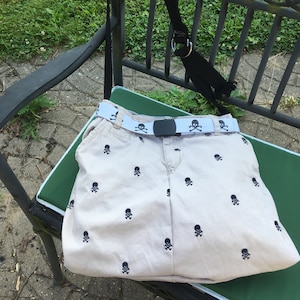 Skull & Crossbones on Khaki Jeans bag - Black Skull and Crossbones on white belt