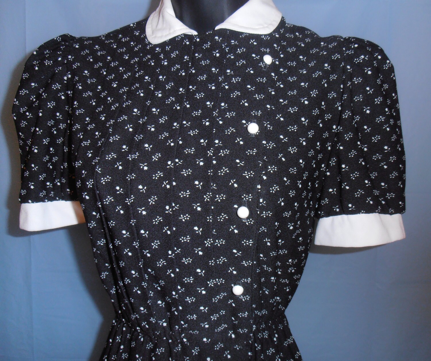 elaine benes black and white shoes