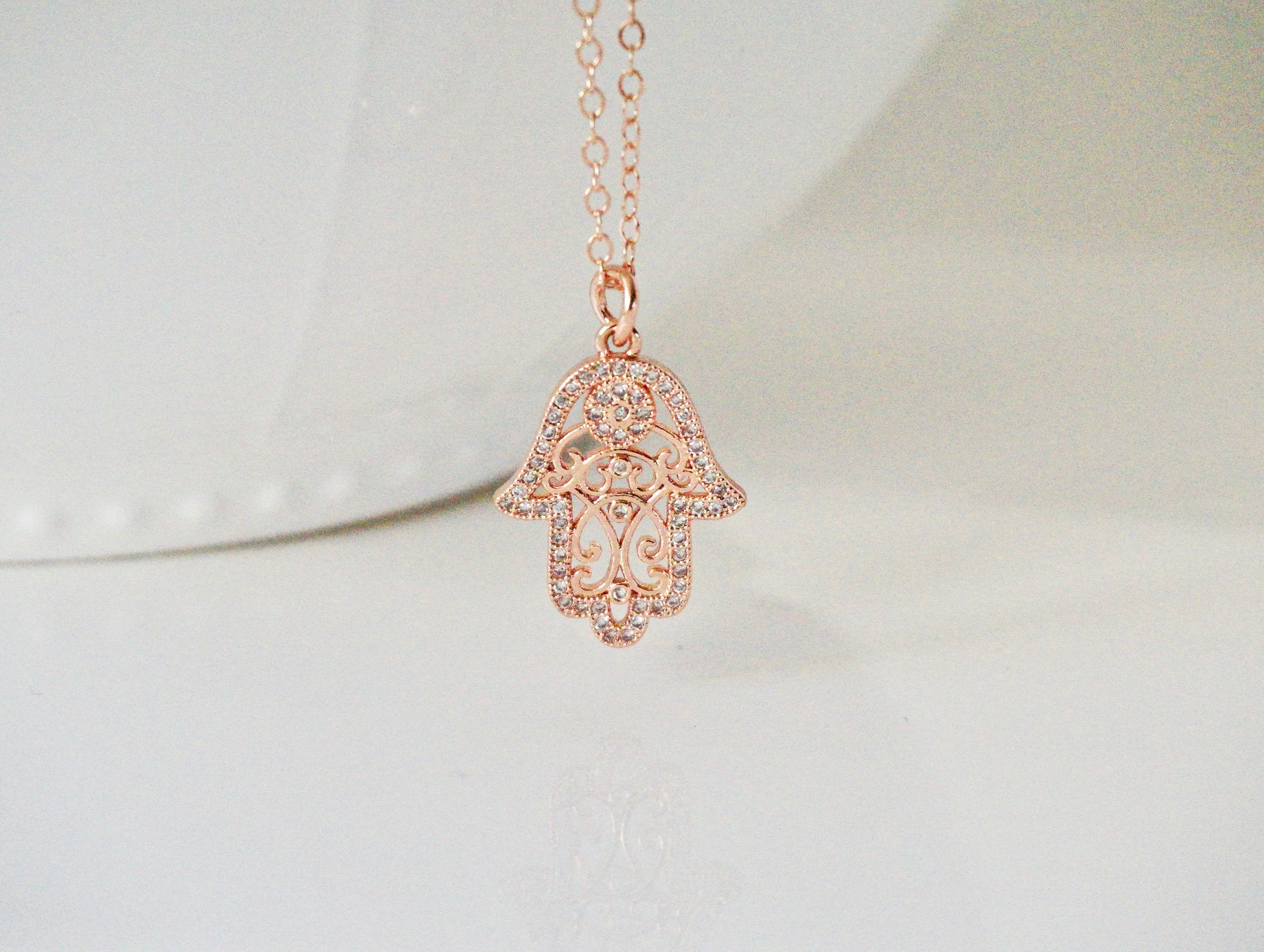 Hand of fatima necklace rose gold deals