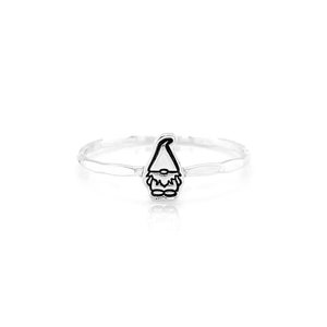 May include: A silver ring with a small, black and white gnome design. The ring is textured and has a hammered finish.