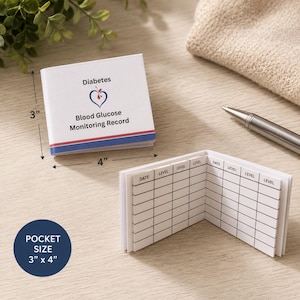May include: A white diabetes blood glucose monitoring record booklet measuring 3 inches by 4 inches. The cover features a blue heart icon with a red drop and text. The interior pages contain a printed grid with columns labeled Date and Level.