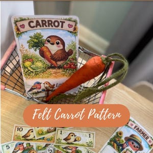 May include: A felt carrot pattern with a felt carrot and game pieces. The carrot is orange with green leaves. The game pieces have bird illustrations and text that says "CARROT", "PDF PATTERN", "BEGINNER FRIENDLY", and "INSTANT DOWNLOAD".