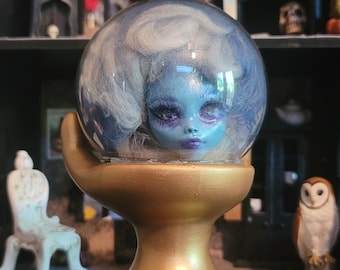 Madame Leota head in a Crystal Ball