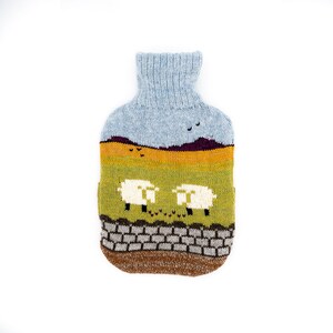 Knitted Lambswool hot water bottle cover with countryside design