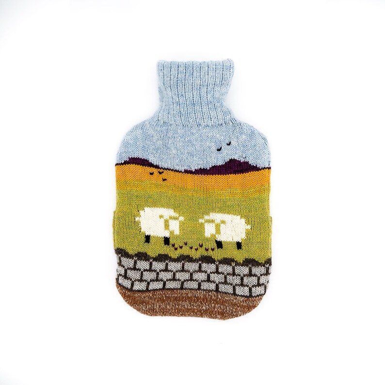 Knitted Lambswool hot water bottle cover with countryside design image 1