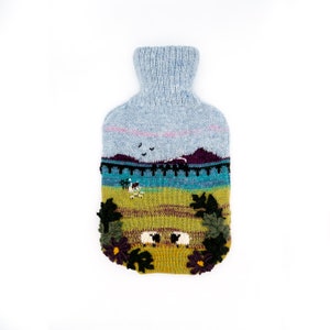 Knitted Lambswool hot water bottle cover with viaduct, lake and grazing sheep design - bottle included