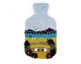 Knitted Lambswool hot water bottle cover with viaduct, lake and grazing sheep design - bottle included