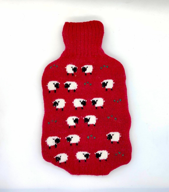 Knitted Lambswool hot water bottle cover with grazing sheep design