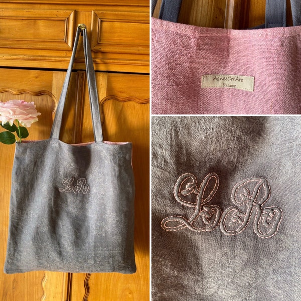 Tote bag made of an antic damasked linen napkin monogram LR , dyed grey, and 1 pink side