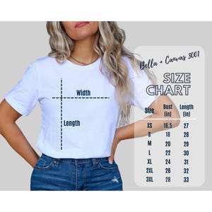 K&ouml;nnte beinhalten: Eine wei&szlig;e Bella + Canvas 3001 T-Shirt Gr&ouml;&szlig;entabelle mit Ma&szlig;en in Zoll. Die Tabelle zeigt Brust- und L&auml;ngenma&szlig;e f&uuml;r die Gr&ouml;&szlig;en XS, S, M, L, XL, 2XL und 3XL.