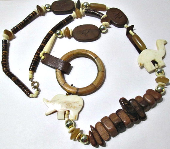 Vintage Necklace Long Carved Ox-Bone Animals Rhin… - image 1