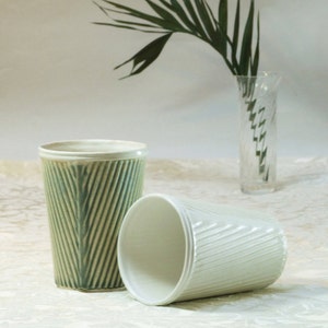Coffee cup. Modern paper porcelain cups in taupe, blue, brown and white ceramic cups. Also a plant pot Travel mug drinkware and homeware image 4