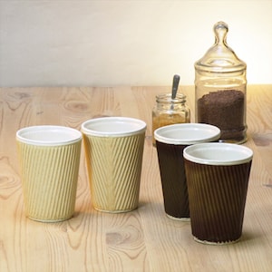 Coffee cup. Modern paper porcelain cups in taupe, blue, brown and white ceramic cups. Also a plant pot Travel mug drinkware and homeware image 1