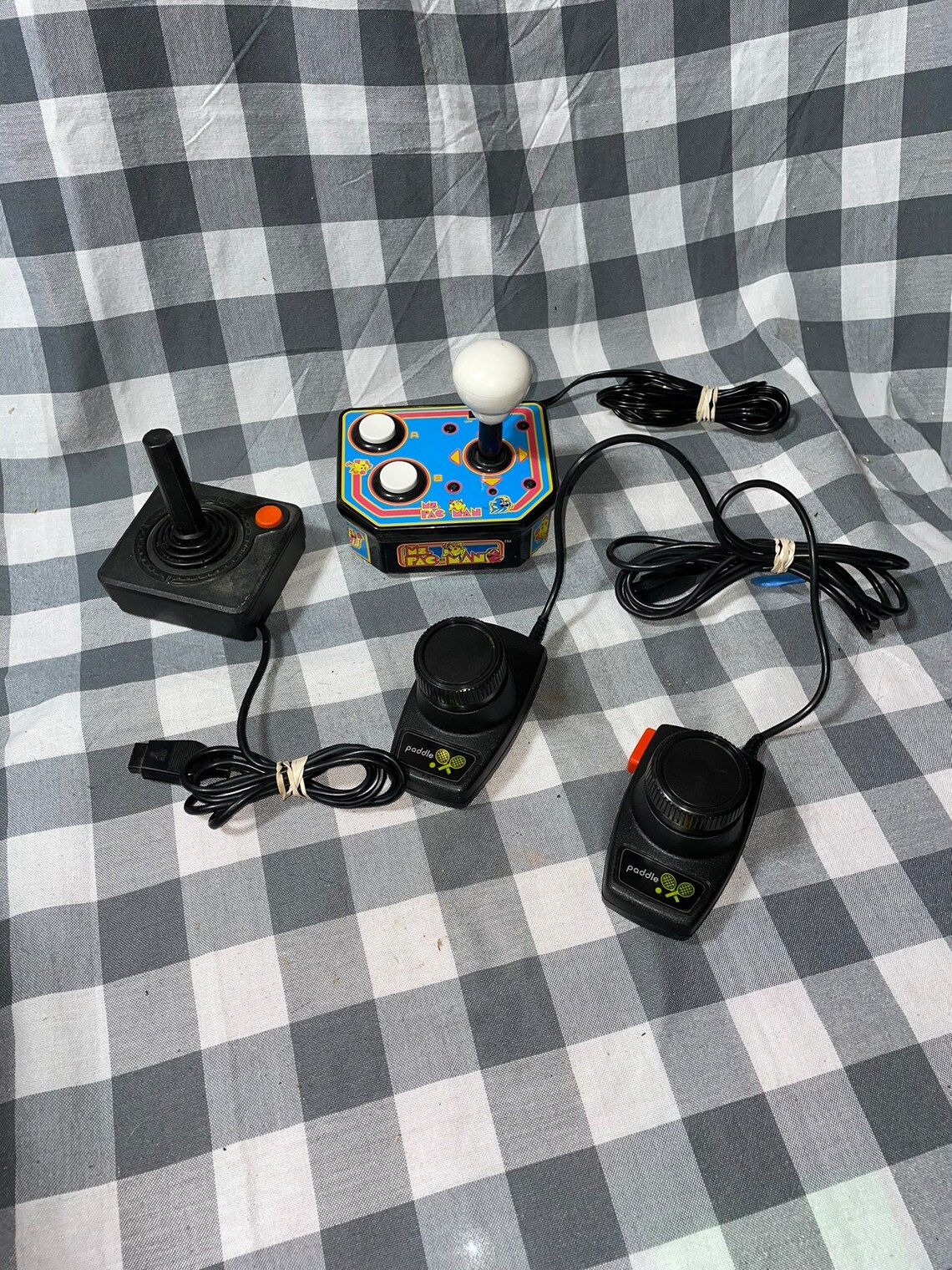 Antique Atari Joystick and 2 Paddle Controllers, and Mrs. Packman Game