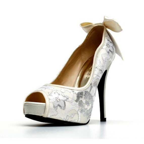 white heels with a bow