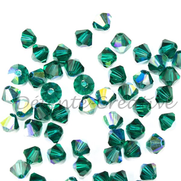 50 Pcs - Perles toupies 5328 - Cristal de SWAROVSKI Emerald AB  4 mm