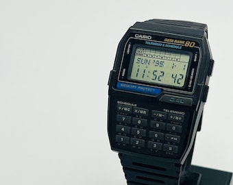 Nerd watch CASIO DBC 80 late 1990s module 1486 casio data bank telememo watch