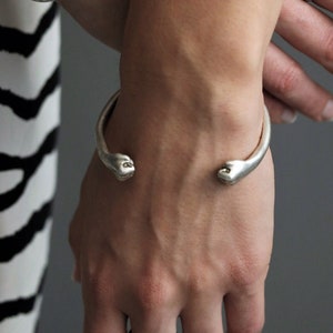 Antique silver fists bracelet, silver plated double punches open cuff, minimal torque bracelet, striking hands unisex bracelet, gift idea