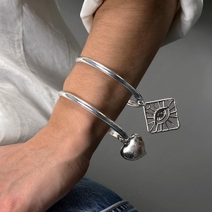 Antique Silver Heart Charm Bracelet• Smooth Puffed Evil Eye Bangle• Square Evil Eye Dangling Heart Bangles by AnAngelsHug• Birthday Present