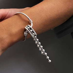 Silver Wavy Open Cuff• Tassel Ball Chain Bracelet• Extraordinary Fringe Bracelet• Modern Rock Curved Bangle by AnAngelsHug• Birthday Gift