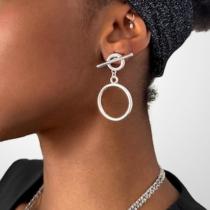 Contemporary mismatched earrings, long bar and circle set earrings, asymmetrical o ring and spike earrings, edgy different earrings set