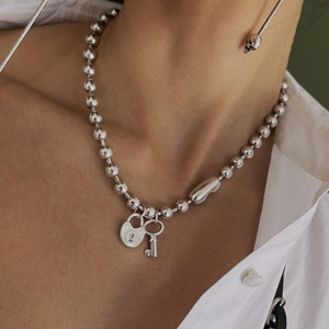 Uno de clearance 50 zipper necklace