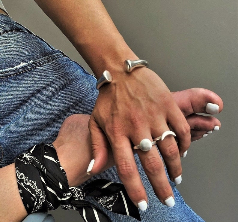 Heavy powerful African bone bracelet, bold massive silver brass bangle, oversized hammered textured bracelet, chunky row vintage open bangle 