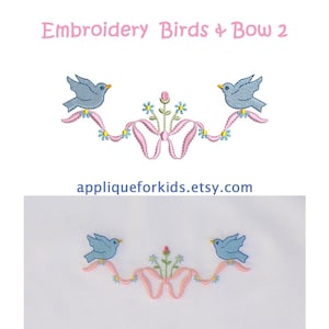 May include: An embroidery design featuring two light blue birds perched on a pink ribbon garland with a central pink bow and small blue and green floral accents. The text Embroidery Birds & Bow 2 and the website address appliqueforkids.etsy.com are visible.