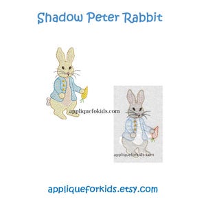 May include: An embroidery design featuring Shadow Peter Rabbit with the text Shadow Peter Rabbit, applique-fokids.com, and applique-fokids.etsy.com. The design shows two rabbits in blue jackets holding carrots, rendered in yellow and grey stitch patterns.