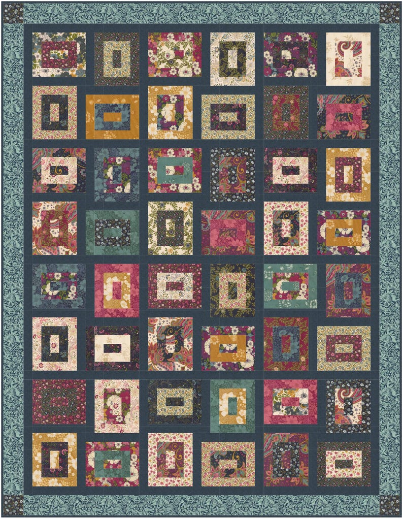 May include: A rectangular quilt featuring a grid of nested rectangular blocks in various floral and paisley patterns. The colour palette includes shades of deep blue, mustard yellow, magenta, cream, and teal, finished with a dark blue floral border.
